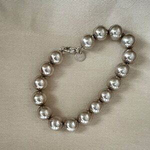 Authentic Tiffany silver bracelet. Box not included. Clasp closure.